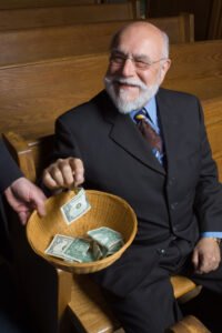 a man holding a basket full of money